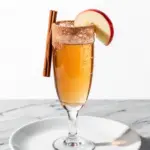 spiced apple cider mimosa - featured image